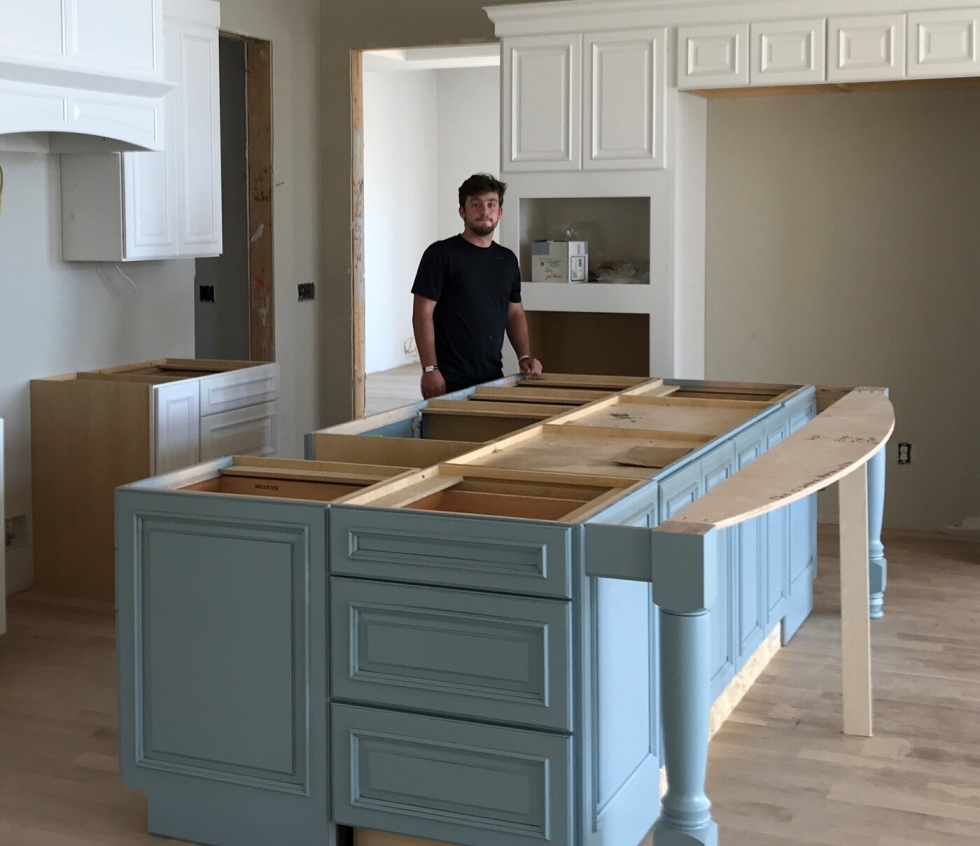 boy in a kitchen that's under construction